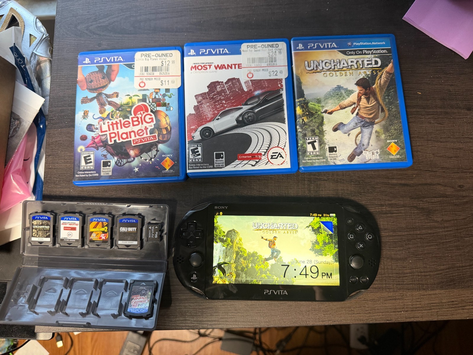 Sony PS Vita PCH-2001 Black Complete Bundle – Games, Memory Cards, Carrying Case